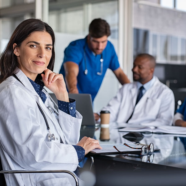 doctors sitting at table