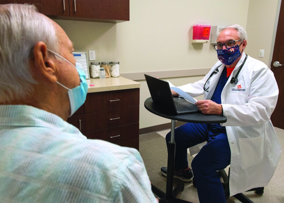 Doctor With Patient