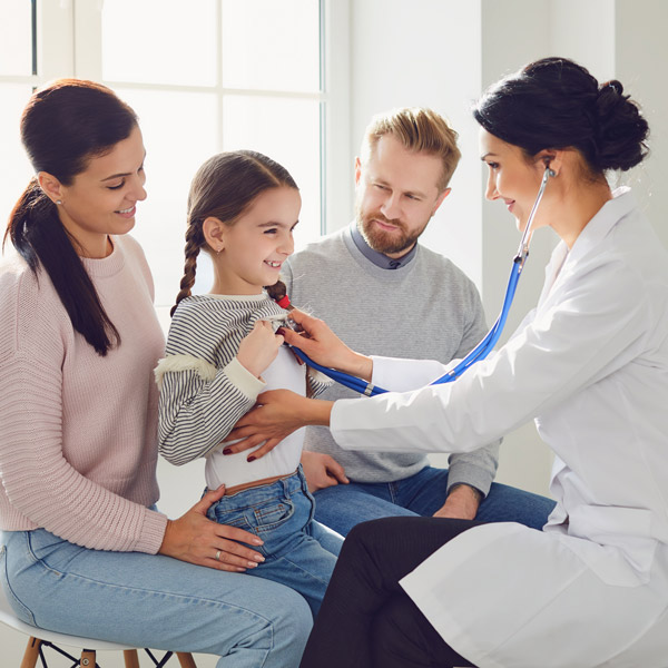 Happy Family Visiting Doctor